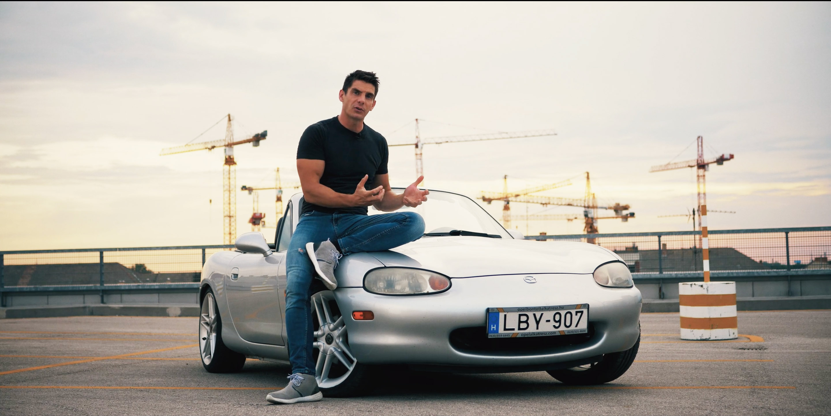 alex-muir-with-mx5-miata-on-roof